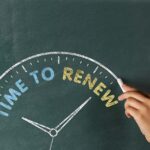 
                            A clock drawn on a chalkboard, with 